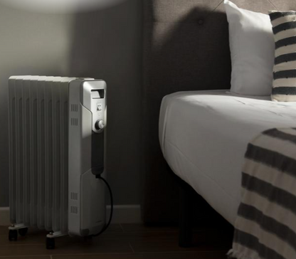 ReadyWarm 9000 Space. Aquecedor elétrico a óleo com 9 Módulos, Baixo consumo de energia, 2000 W, 3 níveis de potência, Recolhe-cabos, Sistema de segurança, Rodas, 20 m2